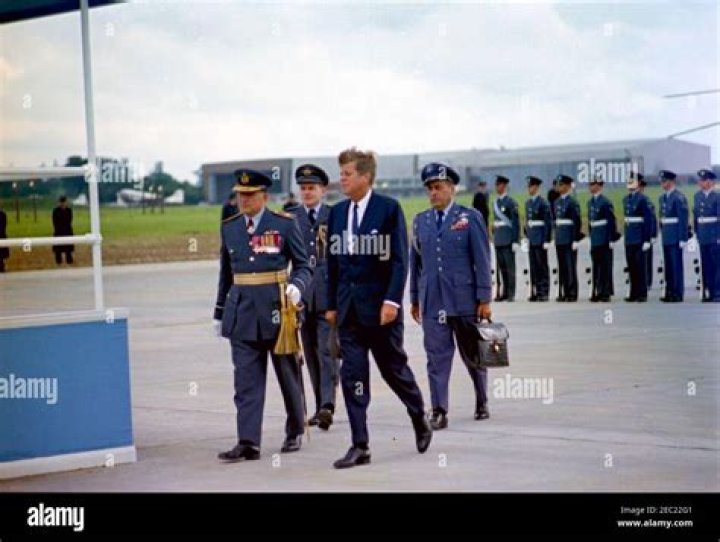 Trip to Europe: England, Gatwick: President Kennedy arrives at Gatwick airport, greeted by Prime Minister Harold Macmillan of Great Britain, 5:30PM